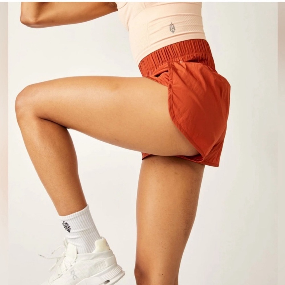 FREE PEOPLE  Movement Way Home Shorts in Russet Orange size M